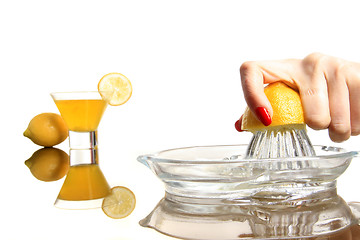 Image showing squashing lemon