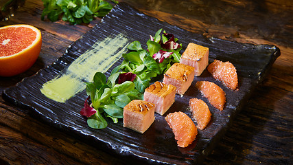 Image showing Grill salmon salad, with mixed greens, avocado,grapefruit. Delicious healthy eating.