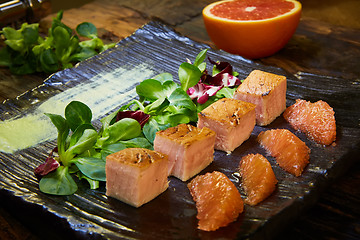 Image showing Grill salmon salad, with mixed greens, avocado,grapefruit. Delicious healthy eating.