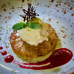 Image showing Grilled pineapple with vanilla ice cream