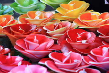 Image showing color flowers candles