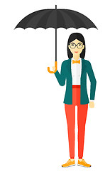 Image showing Business woman standing with umbrella.