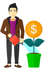 Image showing Man watering money flower.