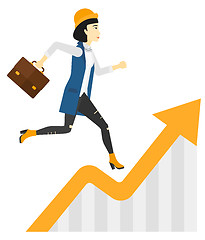 Image showing Woman running on growth graph. 