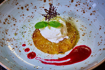 Image showing Grilled pineapple with vanilla ice cream