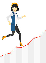 Image showing Business woman walking upstairs.