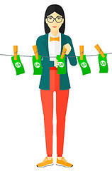 Image showing Business woman loundering money.