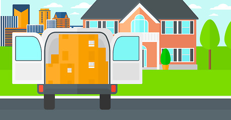 Image showing Background of delivery truck with an open door and cardboard boxes in front of house.