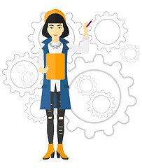 Image showing Woman standing on gears background.