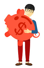 Image showing Man carrying piggy bank.