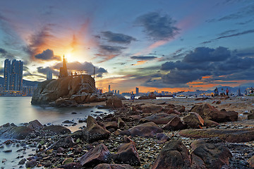 Image showing Light House at sea Cove at Sunset