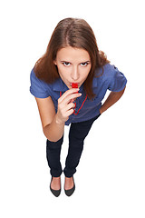 Image showing Female blowing a whistle and pointing at you