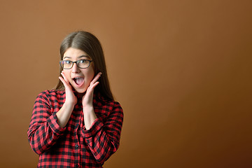 Image showing Surprised happy teen girl