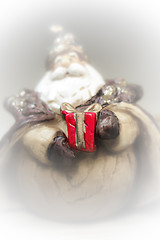 Image showing a gift from Santa Claus. White smoke