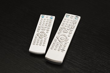 Image showing Remote controls for tv and dvd