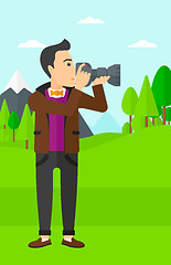 Image showing Photographer taking photo.