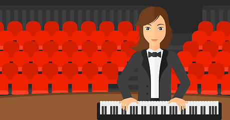 Image showing Woman playing piano.