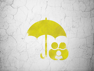 Image showing Security concept: Family And Umbrella on wall background