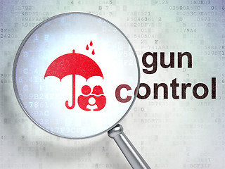 Image showing Protection concept: Family And Umbrella and Gun Control with optical glass