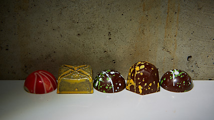 Image showing various chocolates as a background 