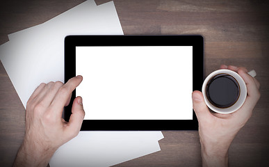 Image showing Tablet touch computer gadget on wooden table