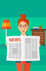 Image showing Reporter reading newspaper.