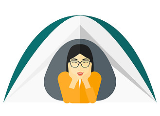 Image showing Woman lying in tent.