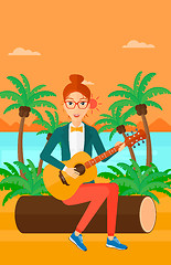 Image showing Woman playing guitar.