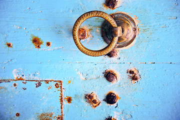 Image showing rusty metal   nail dirty  and morocco knocker