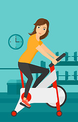 Image showing Woman doing cycling exercise.