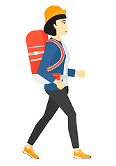 Image showing Woman with backpack hiking.