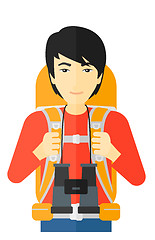 Image showing Cheerful backpacker with binoculars.