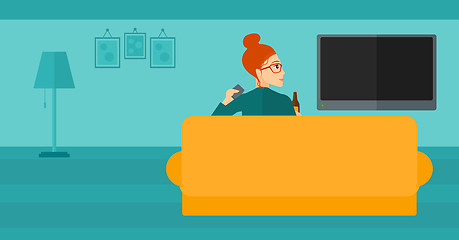 Image showing Woman watching TV.