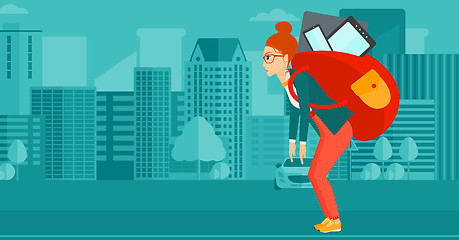 Image showing Woman with backpack full of devices.