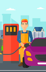 Image showing Man filling up fuel into car.