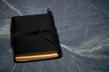 Image showing closed leather bound journal