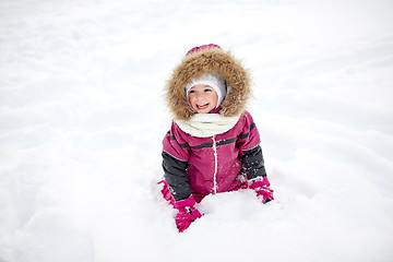 Image showing f happy little child or girl with snow in winter