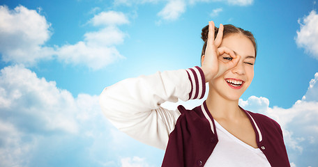 Image showing happy teenage girl making face and having fun