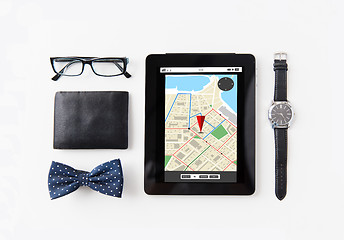 Image showing tablet pc with navigator map and personal stuff