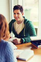 Image showing students with books preparing to exam in library