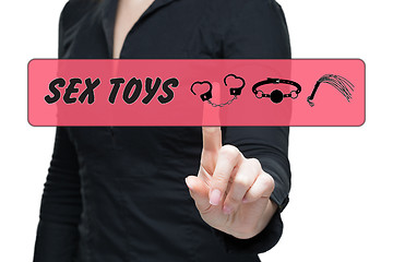 Image showing Sex Toys word on virtual screen push by business woman. 