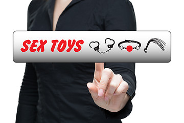 Image showing Sex Toys word on virtual screen push by business woman. 