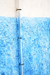 Image showing blue  in texture wall and  morocco water pipe