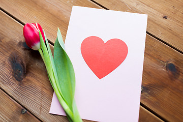 Image showing close up of flowers and greeting card with heart