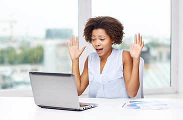 Image showing african woman with laptop at office