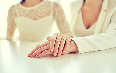 Image showing close up of happy married lesbian couple hugging