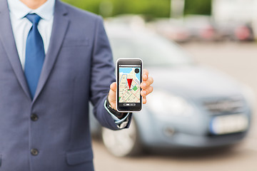 Image showing close up of business man with smartphone navigator