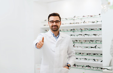 Image showing man with glasses and thumbs up at optics store