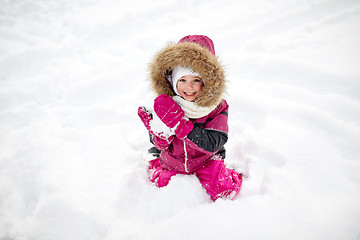 Image showing f happy little child or girl with snow in winter