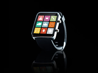 Image showing close up of black smart watch with app icons